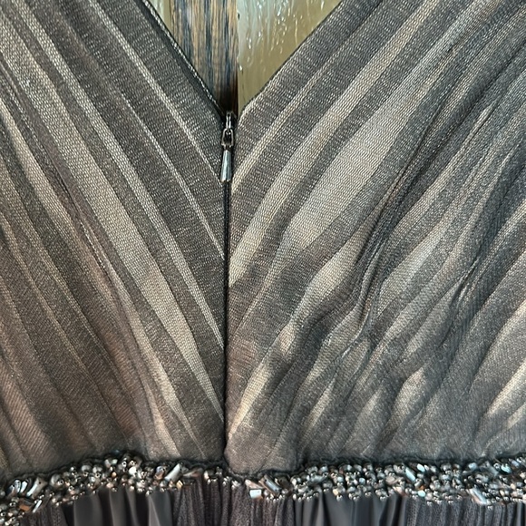 Badgley Mischka
Black Pleated Gown size 6 - Picture 10 of 12